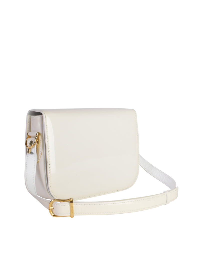 Celine Vintage Creamy White Patent Leather Gold Carriage Logo Flap Sho –  Amarcord Vintage Fashion