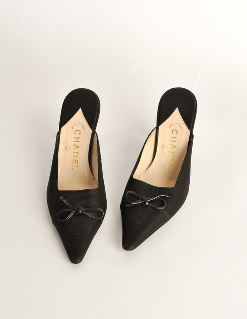 Pointed toe shop mules with bow