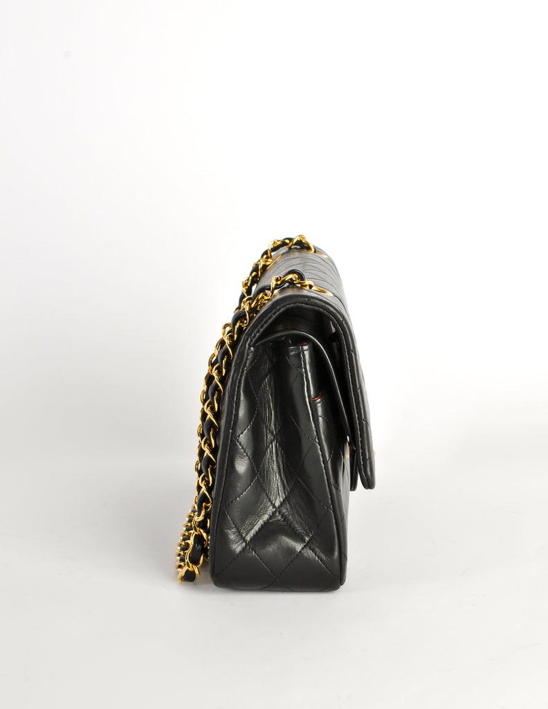 Nass boutique is a multi-brand boutique curating women's clothing and  accessoriesVINTAGE CHANEL BLACK QUILTED FLAP BAG