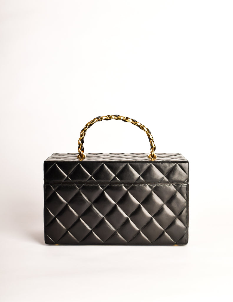 Chanel Vintage 1992 Black Quilted Lambskin Cosmetic Bag Train Case – Amarcord  Vintage Fashion