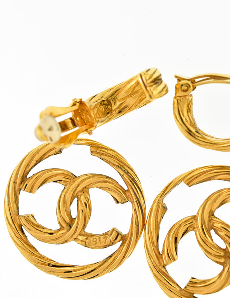 Chanel Vintage Gold Twisted CC Logo Dangle Earrings