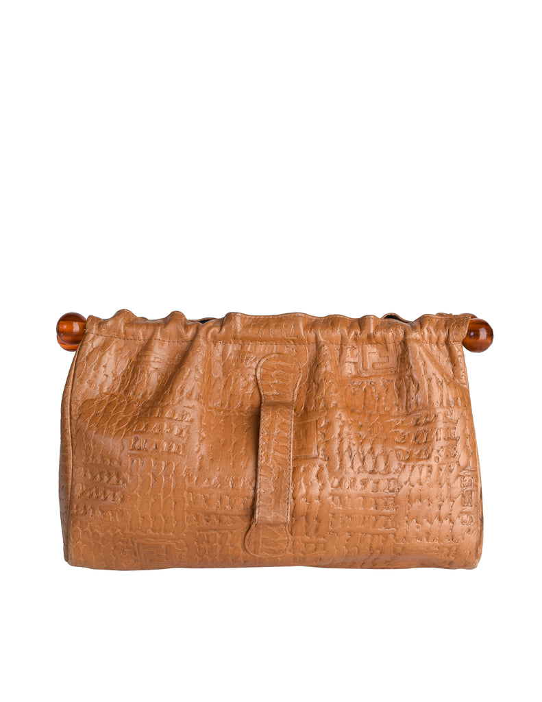 Fendi Vintage Early 1970s Embossed Monogram Butterscotch Leather Clutc –  Amarcord Vintage Fashion